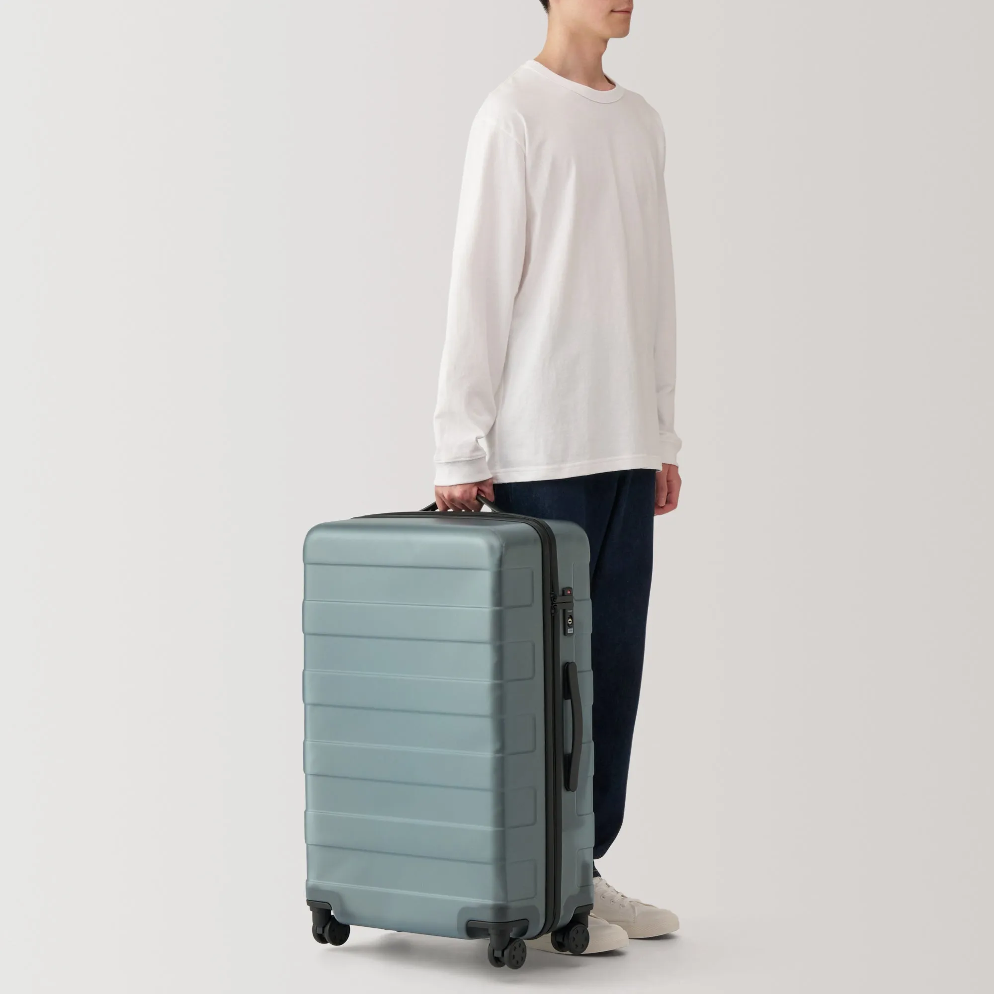 Adjustable Handle Hard Shell Suitcase 75L - Clear | Check-In